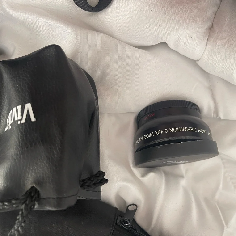 Nikon D3200 with multiple lenses, tons of attachments and comes with accessories